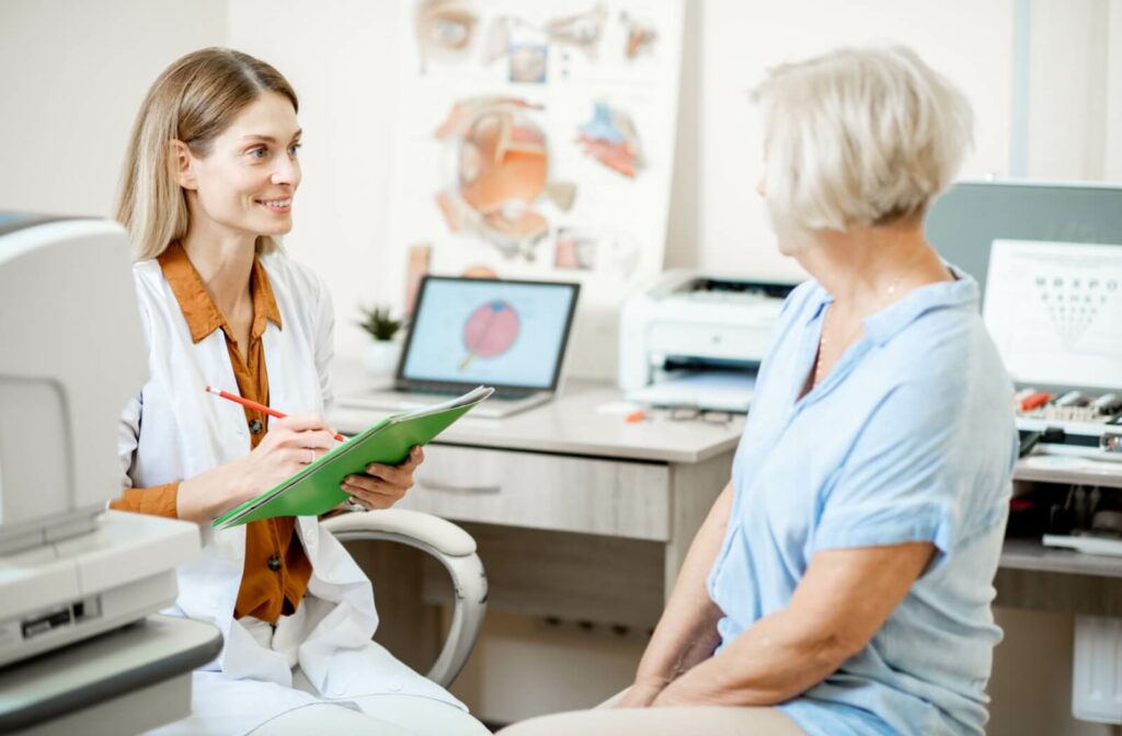 An eye doctor discusses a blepharitis management plan with their patient.